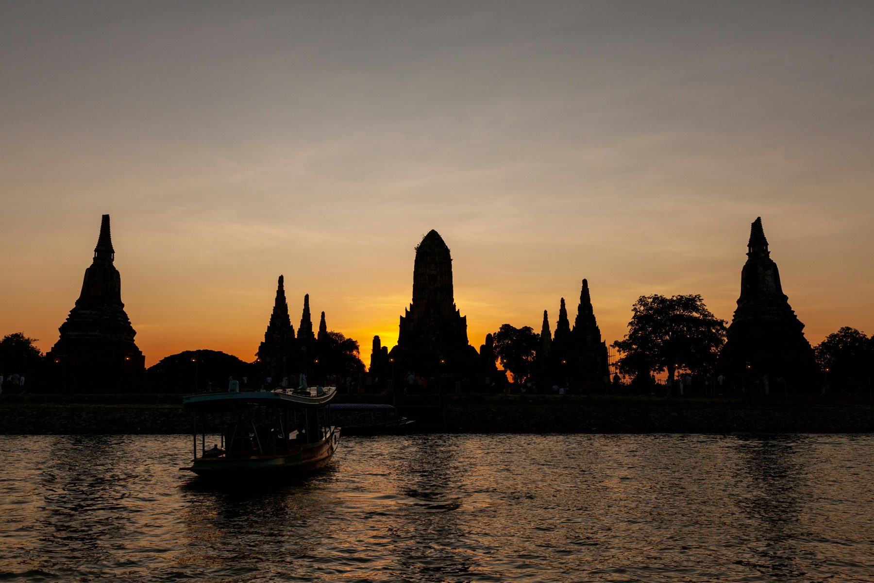 Sunset behind the prangs of Wat Chaiwatthanaram, Ayutthaya